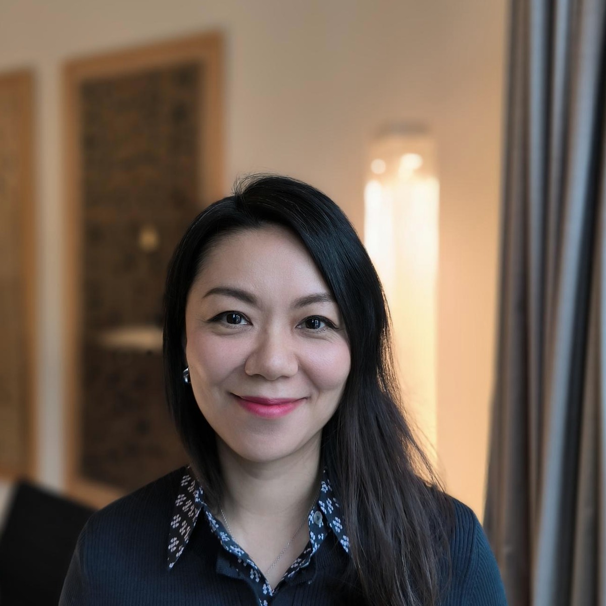 Li Qiu von Qiu Immobilien