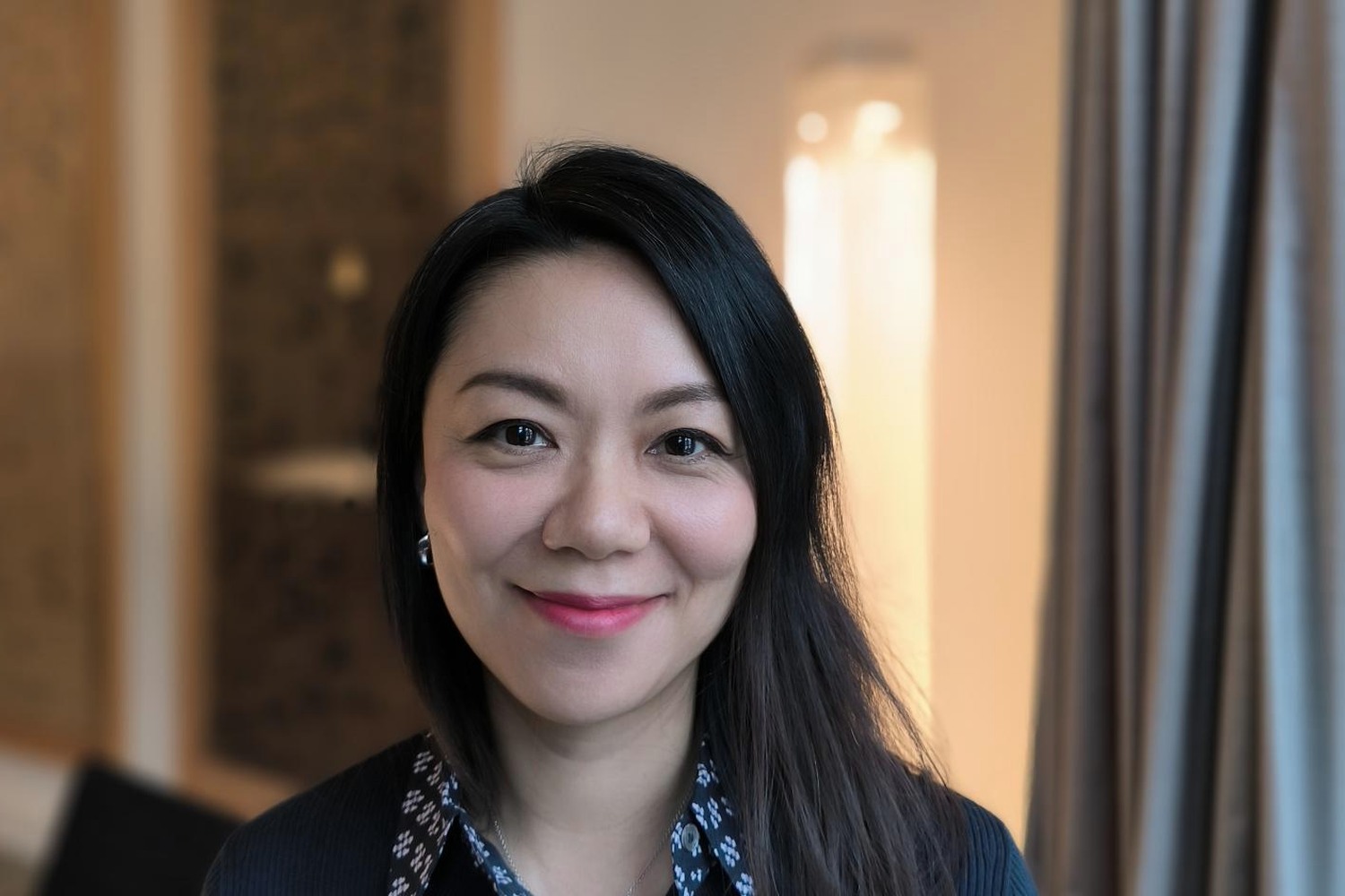 Li Qiu von Qiu Immobilien